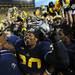 Michigan safety Thomas Gordon celebrates with his teammate on the field after Michigan beat Michigan State 12-10 at Michigan Stadium on Saturday. Melanie Maxwell I AnnArbor.com